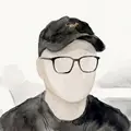 Watercolor portrait of Eric in a cap and glasses.